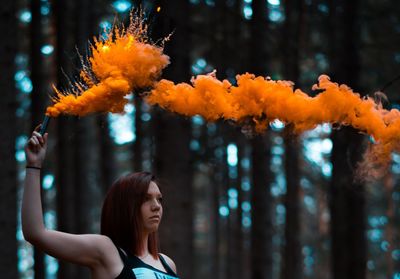 Portrait of young woman looking away