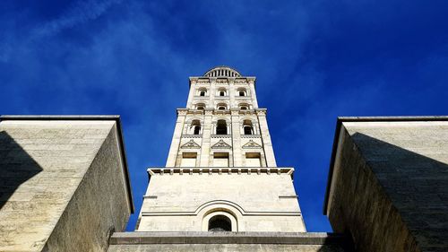 Low angle view of building against blue sky