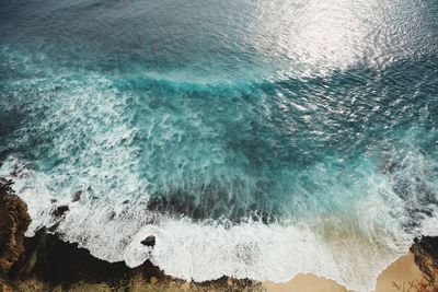 Waves splashing on rocks