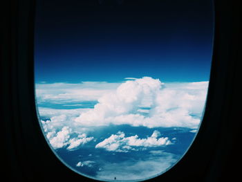 Scenic view of landscape against cloudy sky