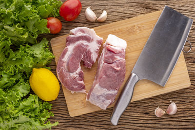 High angle view of vegetables on cutting board