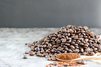 Close-up of coffee beans on table