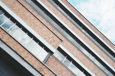 Low angle view of modern building against sky