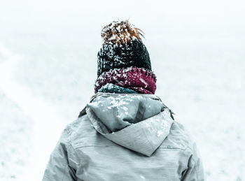 Rear view of person in snow