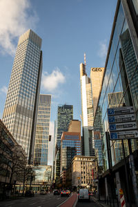 Modern buildings in city against sky