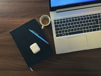 High angle view of coffee cup on table