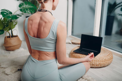 Woman exercising at home