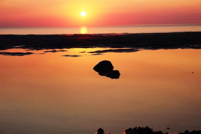 Scenic view of sunset over sea