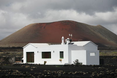 View of landscape against cloudy sky