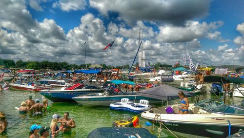 Boats moored at harbor