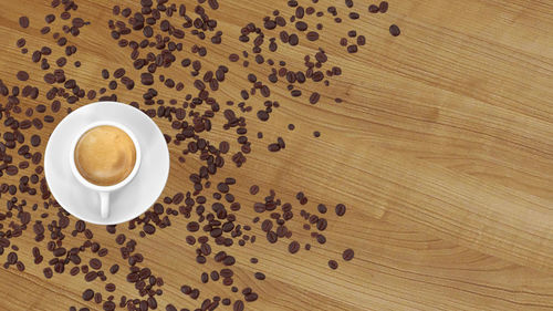 High angle view of coffee cup on table