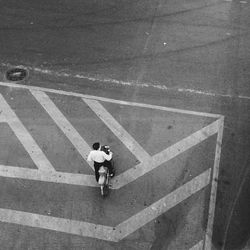 Woman walking on road