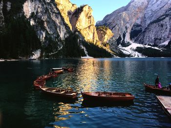 Boat on rock by lake