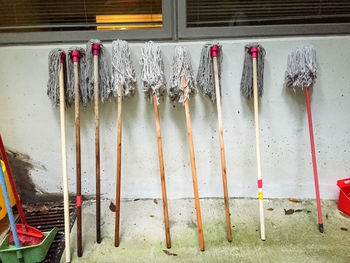 High angle view of clothes drying on wood against wall