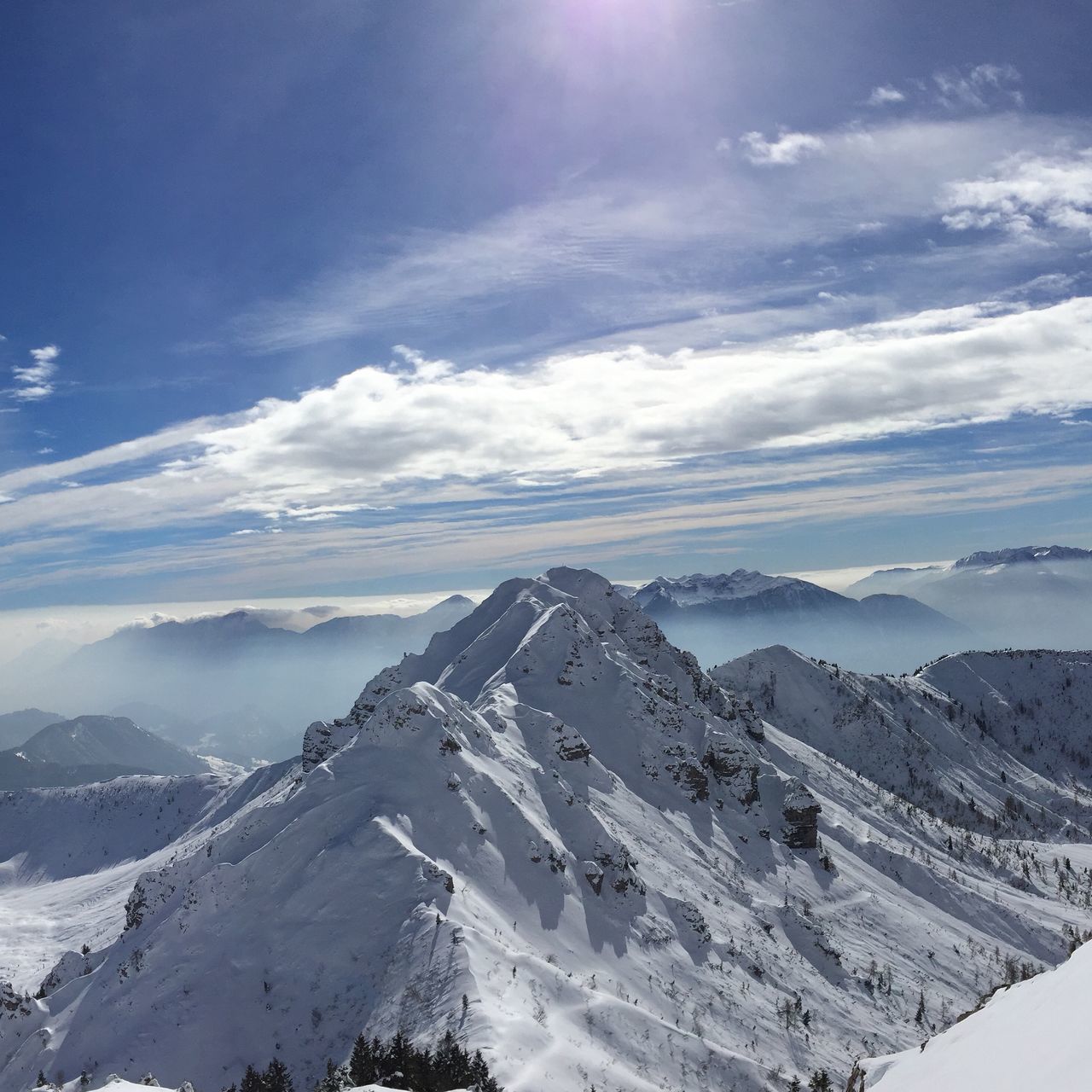 snow, mountain, winter, cold temperature, mountain range, tranquil scene, scenics, landscape, tranquility, beauty in nature, sky, snowcapped mountain, season, nature, weather, cloud - sky, non-urban scene, covering, cloud, idyllic