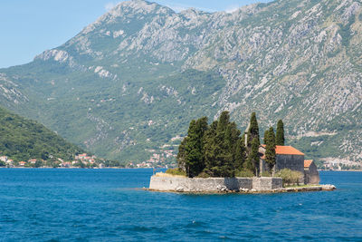 St george island with former benedictine monastery on adriatic sea by mountains