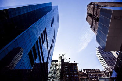 Low angle view of modern building against sky