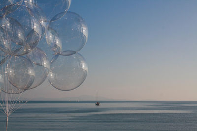 Close-up of sea against clear sky