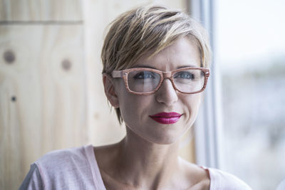 Portrait of businesswoman wearing glasses