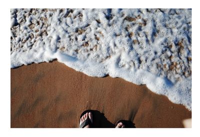 Feet on sand in oaxaca