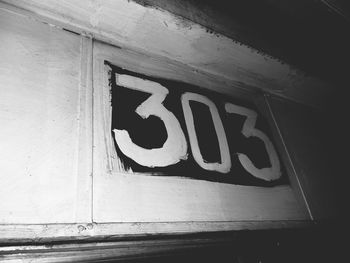 Close-up of text on wall