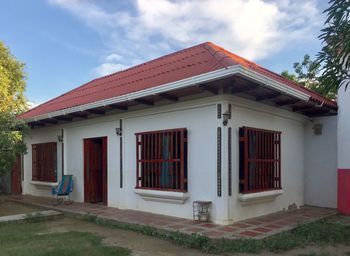 Exterior of house and building against sky