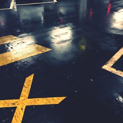 Reflection of road in puddle