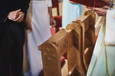 Midsection of man standing at church