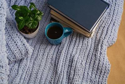 High angle view of coffee cup on table