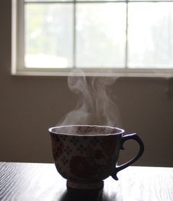 Close-up of coffee emitting smoke