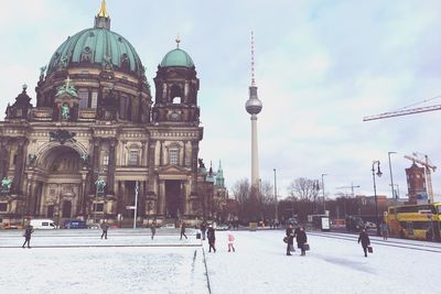 People in front of church in winter