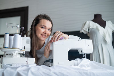 Portrait of smiling woman working