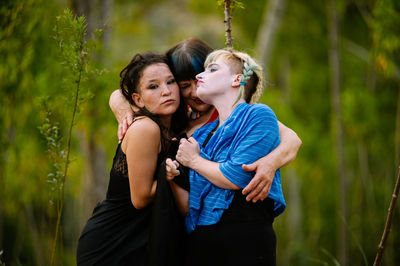 Young couple standing in park