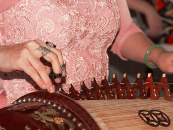 Close-up of woman playing