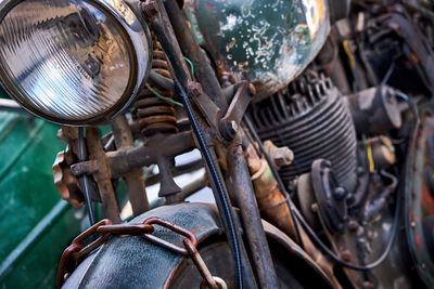Close-up of old rusty motorcycle