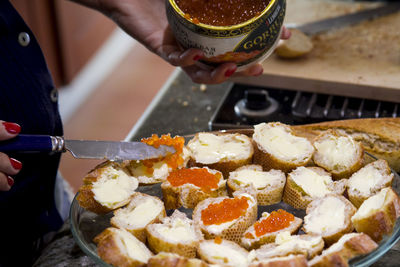 Close-up of man preparing food