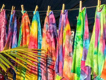Colorful clothes hanging on clothesline