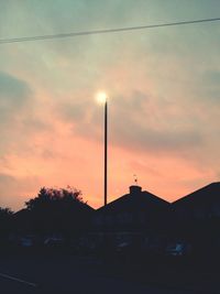 Low angle view of street light against sky at night