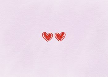 Close-up of heart shape over white background