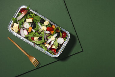 High angle view of chopped vegetables on table