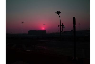 Street light against sky at night