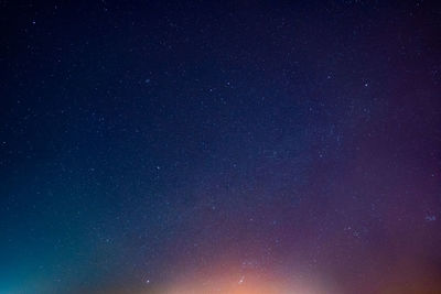 Low angle view of stars against sky at night