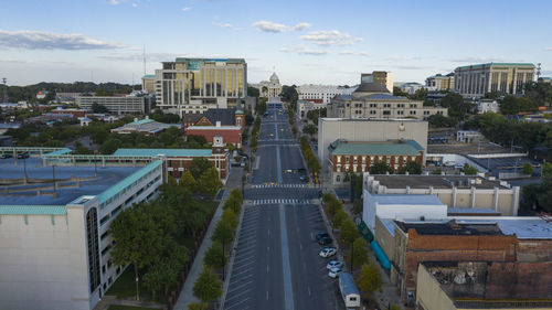 High angle view of buildings in city against sky