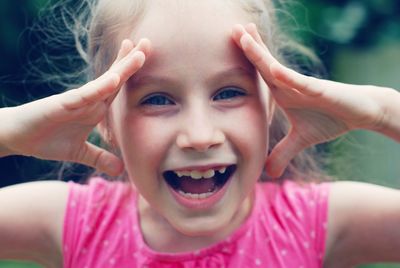 Portrait of cute girl smiling