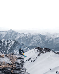 Scenic view of snowcapped mountains during winter