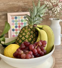 Close-up of fruits in bowl on table