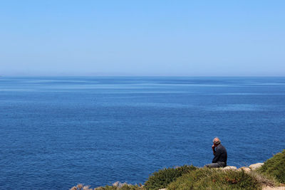 Scenic view of sea against clear sky