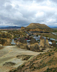 Scenic view of landscape and mountains against sky