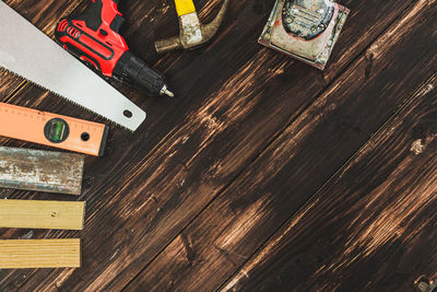 High angle view of text on hardwood floor