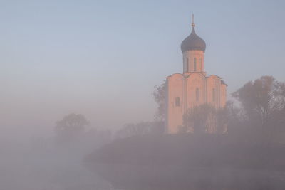 View of historic building against sky during winter
